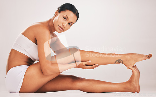 Image of Body, legs and portrait of black woman for health and wellness in studio for skincare epilation and self care. Underwear model person on grey background for healthy diet, hair removal and spa results