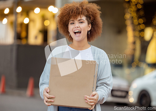 Image of Happy, box and delivery with portrait of black woman in city for ecommerce, logistics and supply chain. Gift, online shopping and sale with customer and package for shipping, product and post