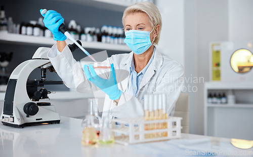 Image of Woman, doctor and micro pipette with mask for experiment, sample or covid testing in scientific research or exam in lab. Female scientist or medical expert working with chemical in science laboratory