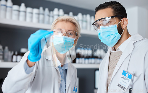 Image of Doctors, medical science and laboratory with face mask or ppe for medicine research, test or analysis. Man and woman scientist collaboration for futuristic chemical cure, innovation and development