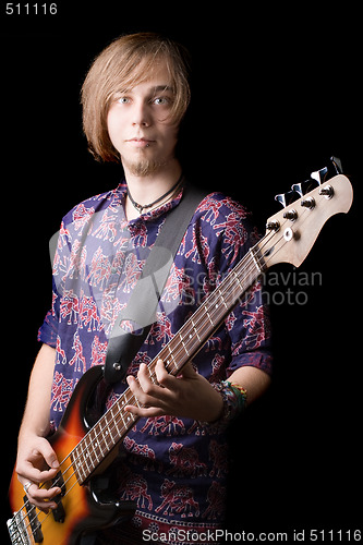 Image of The young man with a guitar