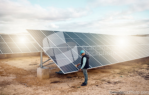 Image of Engineering man, desert and solar panels inspection for future, renewable energy and sustainability of planet. Photovoltaic innovation, clean electricity technology and sustainable goals for earth