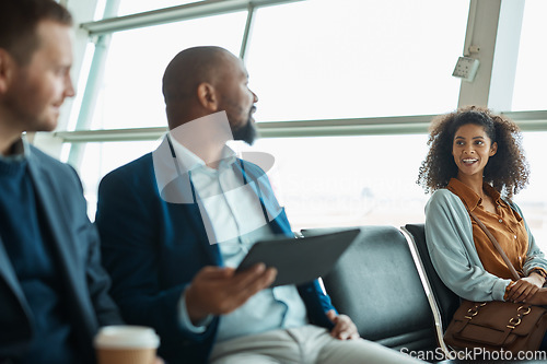 Image of Airport, travel and talking with business people waiting in a departure lounge for an international flight. Global, transport or journey with a man and woman sitting in line in a terminal for flying