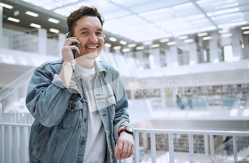 Image of Man, phone call and portrait for a happy conversation in a library building with positive mindset. Young gen z person or college student with smartphone for communication, talking and happiness