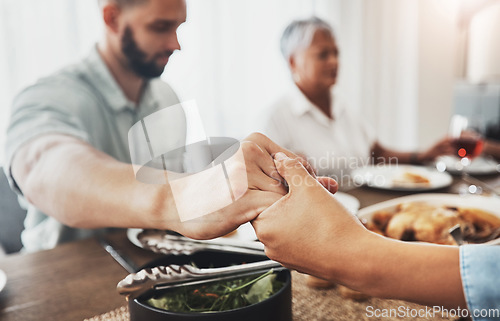 Image of Family prayer, holding hands zoom and dinner buffet at home of grandparents with father at a table. Worship, praying and food for a holiday together in a house with spiritual gratitude for feast