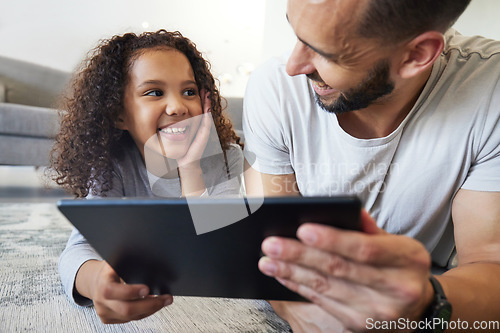 Image of Kid, father or bonding on tablet in house, home or floor for live streaming, watching movies or education social media. Smile, happy child or man on technology for video call, children website or app