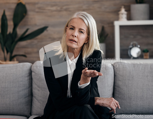 Image of Business therapist, psychology communication and portrait of a mature woman sitting on a couch. Mental wellness worker, psychologist and life coach doing a counseling consultation on a office sofa