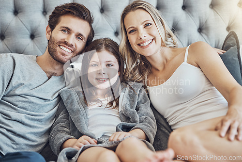 Image of Portrait, mother or father with a child in bedroom relaxing as a happy family bonding in Australia with love or care. Morning, face or fun parents smile with a girl enjoying quality time on a holiday