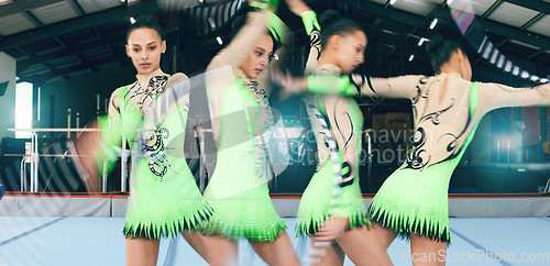 Image of Dance, gymnastics and woman in gym with ribbon, sport and fast athlete workout. Fitness, female gymnast and flexibility with motion blur or training, exercise or rhythmic performance in sports arena.