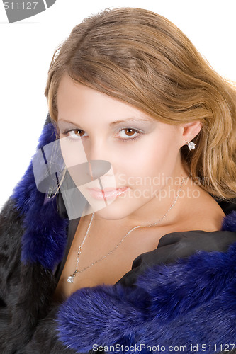 Image of Portrait of the beauty young woman in a fur coat