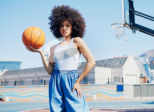 Image of Basketball court, fashion and portrait of black woman in city with attitude, urban style and trendy clothes. Sports, fitness park and girl model outdoors with ball for leisure, confident and stylish