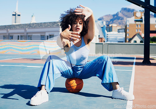 Image of Basketball court, fashion and frame of hands of black woman urban style, feminist and armpit hair in city. Sports, fitness and portrait of girl with ball in stylish, confident and trendy clothes