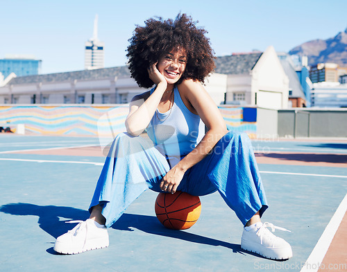Image of Basketball court, fashion and portrait of black woman with smile in trendy, urban style and edgy clothes in city. Sports, fitness park and girl outdoors with ball for motivation, happy and confident