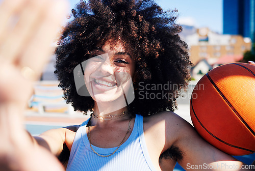 Image of Basketball court, fashion and selfie portrait of black woman with trendy outfit, urban style and edgy clothes. Sports, fitness and hand frame of girl with ball for freedom, energy and happy in city