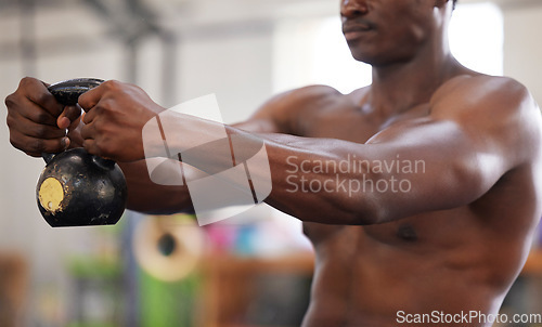 Image of Arm muscle, kettlebell and black man in gym with fitness, body builder and weightlifting. Power, strength training and exercise with muscular biceps, strong and bodybuilding with workout in club