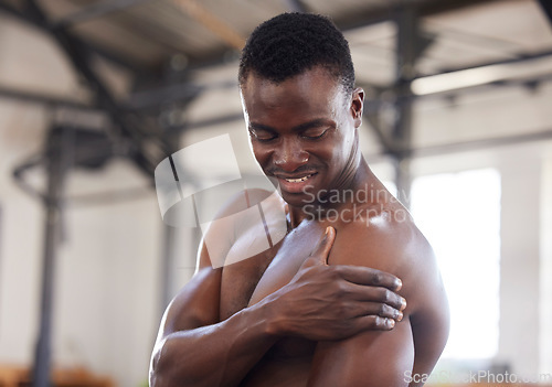 Image of Black man, exercise and arm pain or sports injury at gym for bodybuilder training, workout or fitness. Healthy person with hand on body muscle for orthopedic or arthritis health problem or fail