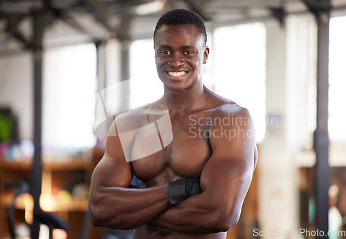 Image of Happy, fitness and portrait of man at gym proud, smile and relax with empowered, mindset and blurred background. Face, bodybuilder and positivity by black guy training, workout and exercise routine