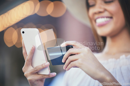 Image of Woman, hands and phone with credit card for ecommerce, purchase or online shopping in city. Hand of happy female shopper smiling holding smartphone for internet banking, 5G connection or transaction