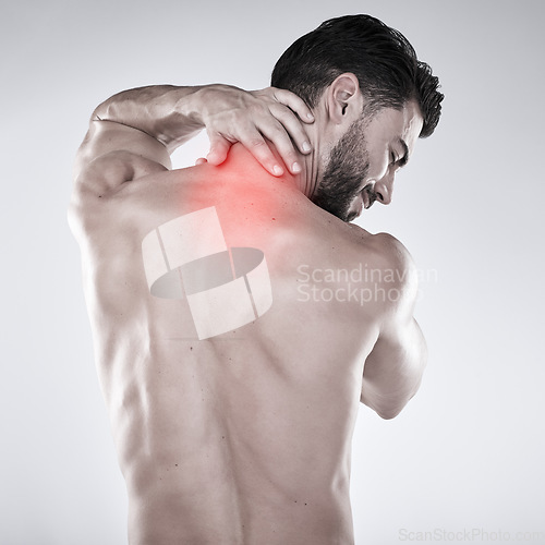 Image of Fitness, hand or sports man with neck pain after exercise, body training injury or gym workout with injured muscle. Red glow, back view or stressed bodybuilder suffering isolated on studio background