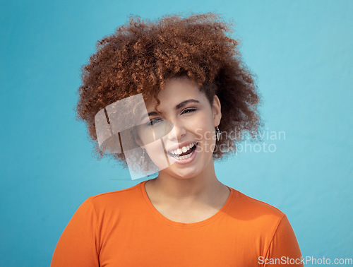 Image of Black woman, portrait smile and afro for profile, vision hair style against blue studio background. Happy African American female smiling with teeth in joyful happiness or positive attitude on mockup