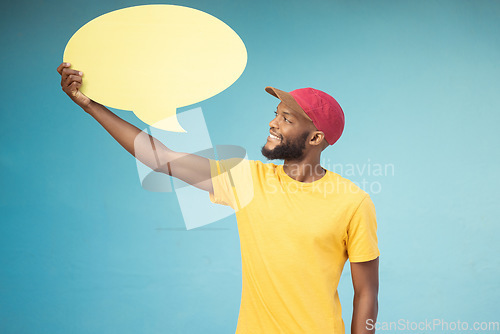 Image of Speech bubble, advertising and black man on blue background for announcement, news and information. Marketing, opinion mockup and male smile with copy space on poster, billboard and sign for voice