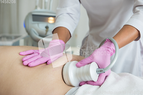 Image of Belly cavitation at modern beauty clinic