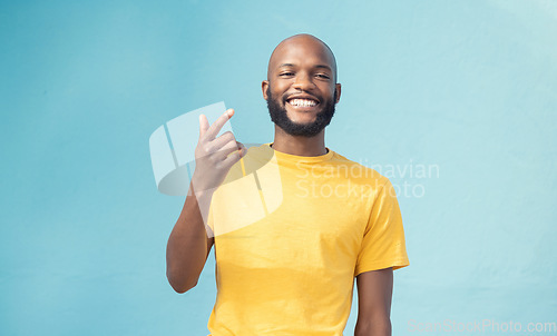 Image of Black man, portrait or hand gesture on blue background, isolated mockup or wall mock up in cool story, hey or attention. Smile, happy face or student in trendy, stylish or fashion clothes on backdrop