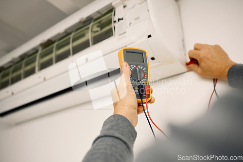 Image of Air conditioner, maintenance hands and voltage meter with construction, wall and technician man. AC repair, professional hvac expert and handyman with digital reading, analysis or engineering service