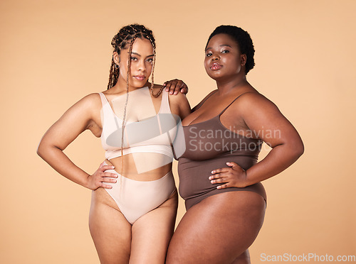 Image of Portrait, beauty and black women with body positivity, skincare and self love isolated in a studio brown background. Shape, plus size and female models confident in underwear as wellness