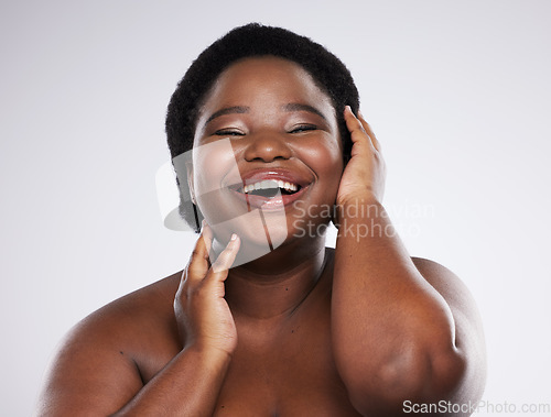 Image of Black woman, beauty and portrait of a young woman with skincare glow from dermatology. Facial, wellness and cosmetics with a model in isolated, gray background and studio laughing with happiness