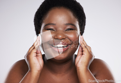 Image of Black woman with cotton pad isolated on a white background for face or facial cleaning product promotion. Happy portrait of model or person with beauty glow, cosmetics wipe and makeup in studio