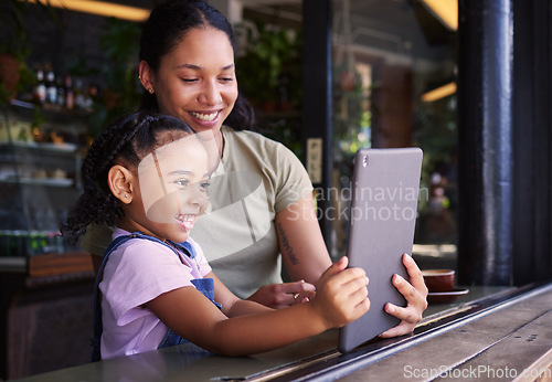 Image of Video call, selfie and mother and girl with a tablet in a restaurant on social media, online and app at a coffee shop. Kid, daughter and child with woman on the internet for communication and talking