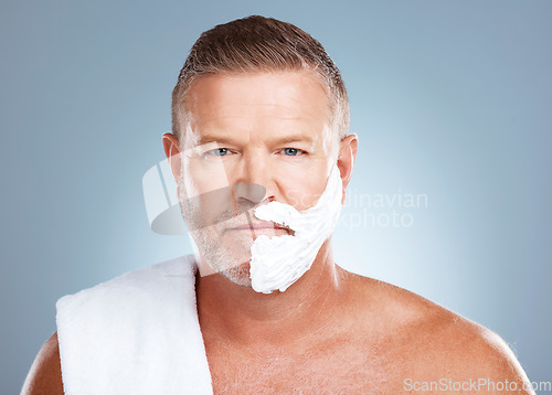 Image of Portrait, shaving cream and old man in studio for skincare, grooming and beauty on grey background. Face, product and hair removal for mature model relax with luxury, skin and beard foam isolated