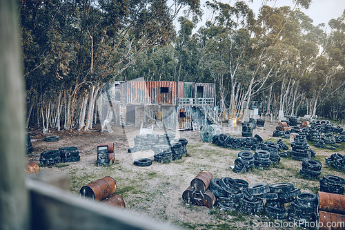 Image of Paintball, no people and army workout ground in nature in the morning on a battlefield. Training, exercise and war game base for competition and fight games outdoor isolated for shooting on grass