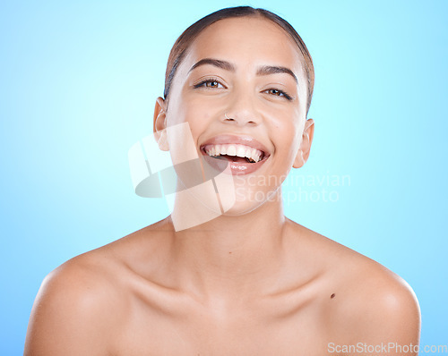 Image of Black woman, studio portrait and beauty with skincare cosmetics, smile and wellness by blue background. Gen z model girl, happy and healthy aesthetic with dermatology, natural skin glow and cosmetic