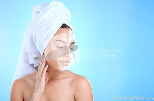 Image of Beauty, face mask and skincare woman with mockup space for dermatology cosmetics. Aesthetic model person with spa facial product advertising self care, skin glow and body wellness on blue background