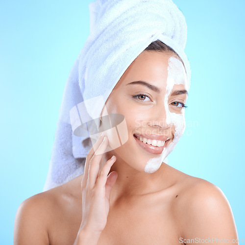Image of Face mask, beauty and portrait of a woman with skincare for dermatology blue background. Aesthetic model person with spa luxury detox cosmetic product for self care, skin glow and facial wellness