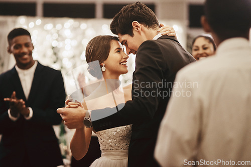 Image of Love, wedding and happy couple doing a dance together for tradition at a marriage reception. Happiness, smile and young husband and wife dancing with intimacy at ceremony party, event or celebration.