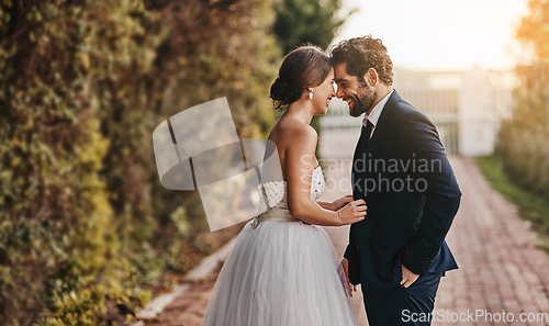 Image of Love, wedding and couple with smile in garden for marriage, ceremony celebration and commitment. Affection, trust and bride and groom hug, embrace and happy for romance, bonding and loving in park
