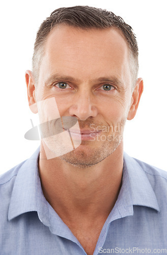 Image of Portrait, face and man with smile looking happy, calm and content isolated against a studio white background. Businessman, entrepreneur or employee confident, handsome and proud wearing a shirt