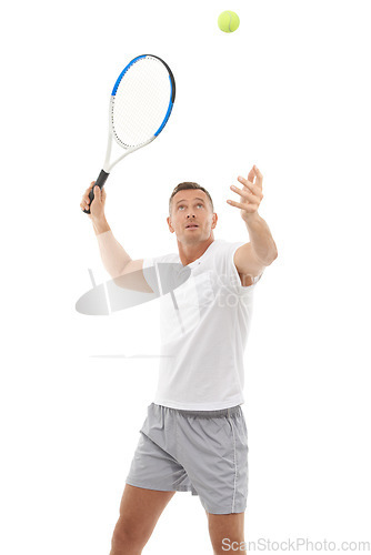 Image of Tennis player, athlete and hitting a ball training, fitness and workout isolated against a studio white background. Man, sports and exercise as a hobby for health and person serve for a match