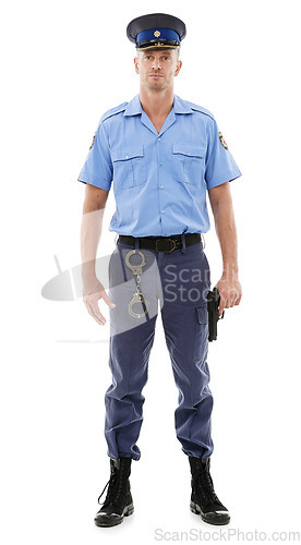 Image of Studio man, portrait and police officer for justice law enforcement, public safety or security service. Gun, criminal handcuffs or violence protection guard of crime hero isolated on white background