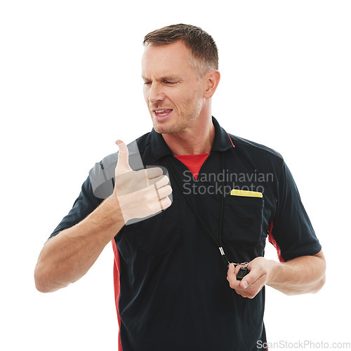 Image of Whistle, thumbs up and male referee in a studio giving instructions, direction or rules for a match. Sports, fitness and professional man coach with a approval gesture isolated by a white background.