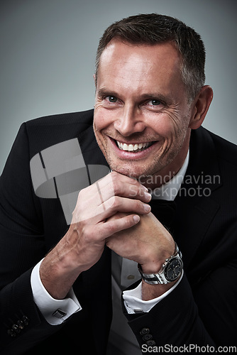 Image of Portrait of mature man, tuxedo and smile, handsome face and serious isolated on grey background in studio. Luxury, glamour and wealth, success and elegant celebrity actor or valentines day date.