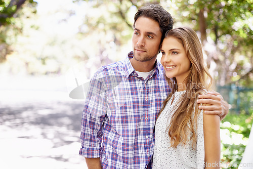 Image of Couple, love and bonding embrace in garden, nature or backyard park on valentines day, romance date or summer break. Smile, happy woman and thinking man in hug for relax support or partnership future