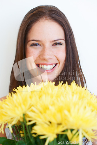 Image of Happy, flowers and smile with portrait of woman for spring, beauty and celebration gift. Present, summer and blossom with face of girl and bouquet isolated on white background for plant and season