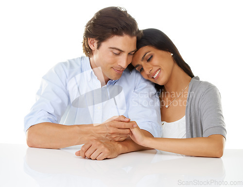 Image of Couple, hand holding and love of interracial people in a studio with white background. Smile, happiness and care of woman and man together with diversity and relax lifestyle feeling happy and calm