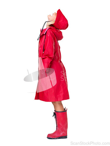 Image of Fashion, red raincoat and woman on a white background with trendy, stylish and waterproof clothes in studio. Winter boots, rain weather and isolated full body of excited, happy and girl with smile