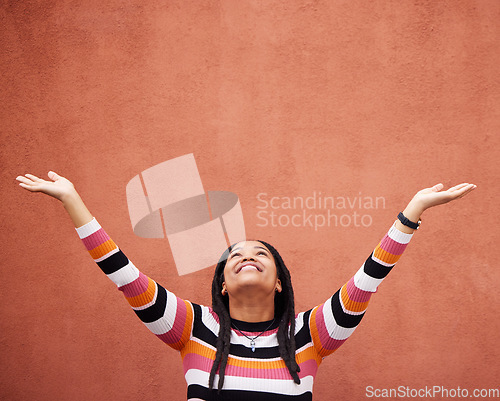 Image of Black woman, hands up and wall background with space for mockup with smile, happy and excited in city. Young gen z girl, outdoor and happiness with mock up, fashion and palm with product placement