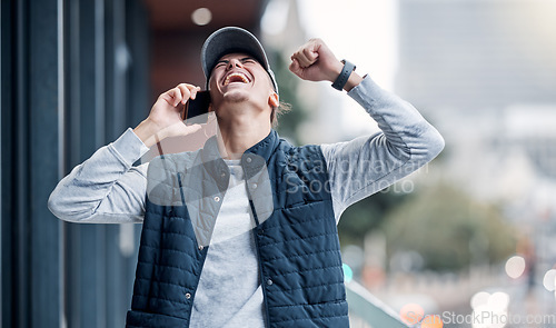 Image of Winner, phone and man on a balcony celebrating good news with a smile from bonus and promotion. Happiness, yes and mobile call connection of a young person with bokeh celebrate winning or achievement